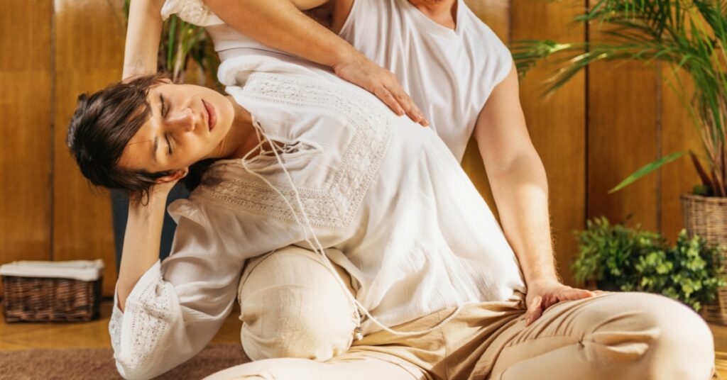 how to massage upper back pain